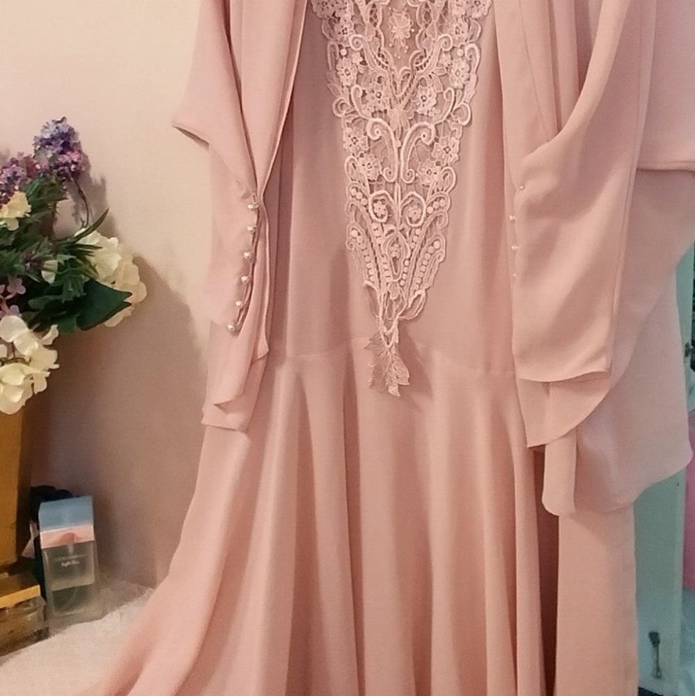 Ursula of Switzerland size 12 flowing pink dress.